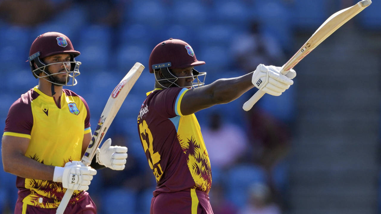 Rovman Powell raises his bat on reaching fifty, West Indies vs England, 2nd T20I, Grenada, December 14, 2023