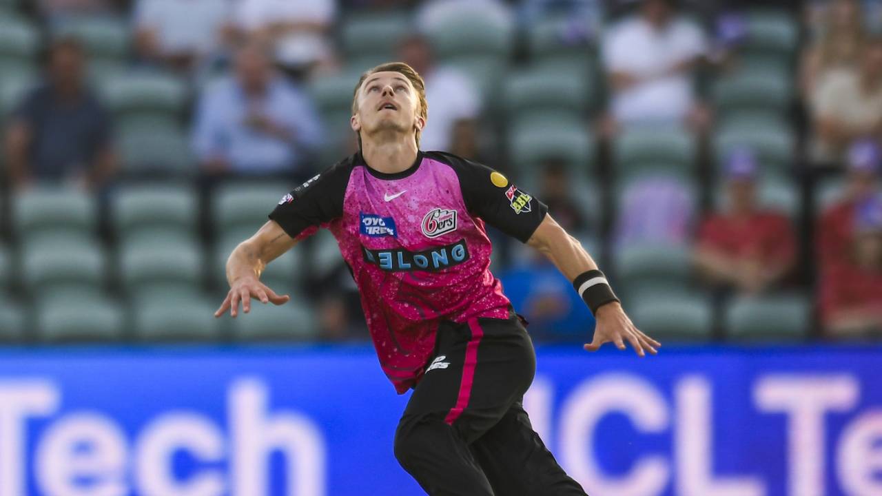 Tom Curran attempts a caught and bowled