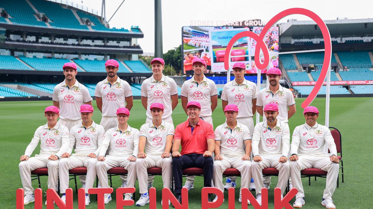 Glenn McGrath poses with the Australia team for the Unite in Pink initiative