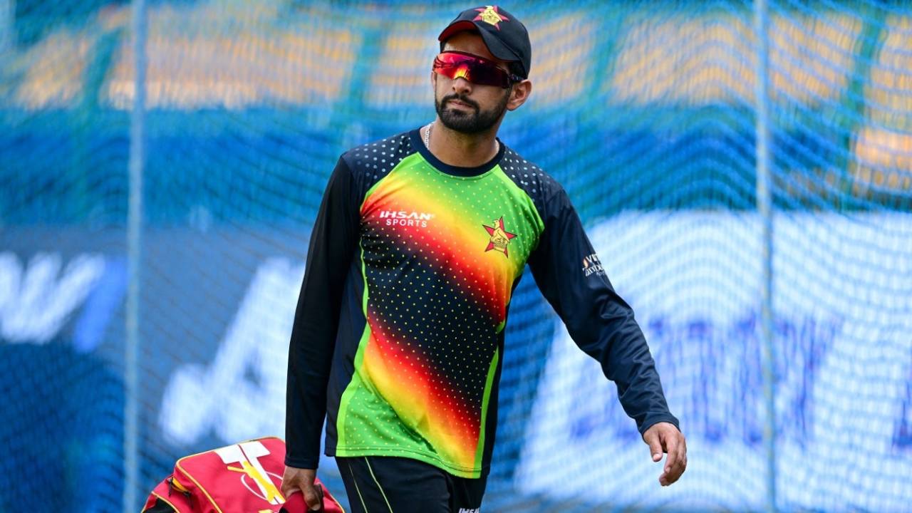 Sikandar Raza carries his batting equipment during a practice session, Colombo, January 4, 2024