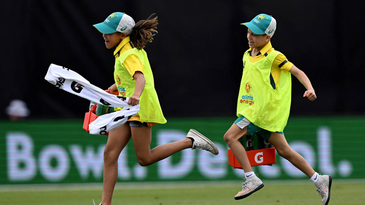 Andrew Symonds' children, Chloe and Will, run drinks during the match, Australia vs Zimbabwe, 1st ODI, Townsville, August 28, 2022