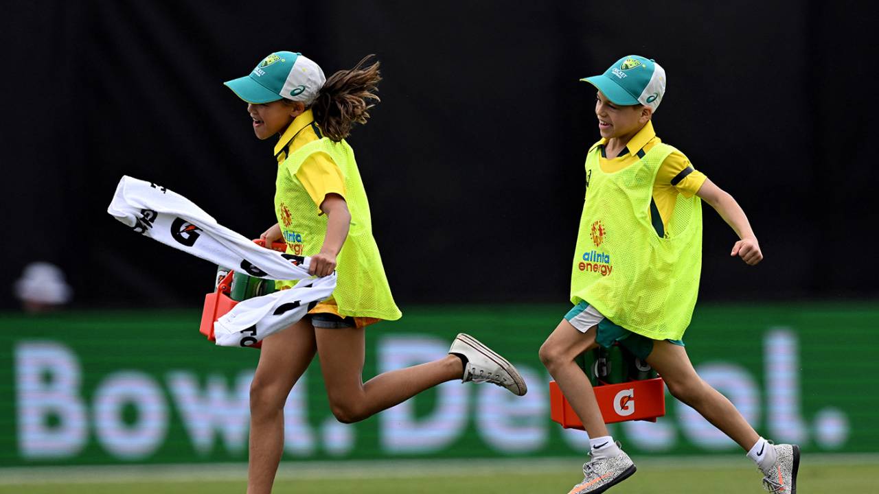 Andrew Symonds' children, Chloe and Will, run drinks during the match, Australia vs Zimbabwe, 1st ODI, Townsville, August 28, 2022
