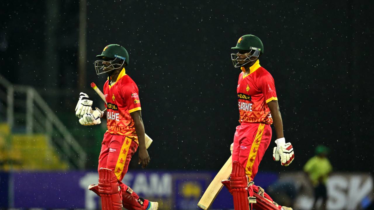 Takudzwanashe Kaitano and Milton Shumba walk back due to a rain interruption, Sri Lanka vs Zimbabwe, 1st ODI, Colombo, January 6, 2024