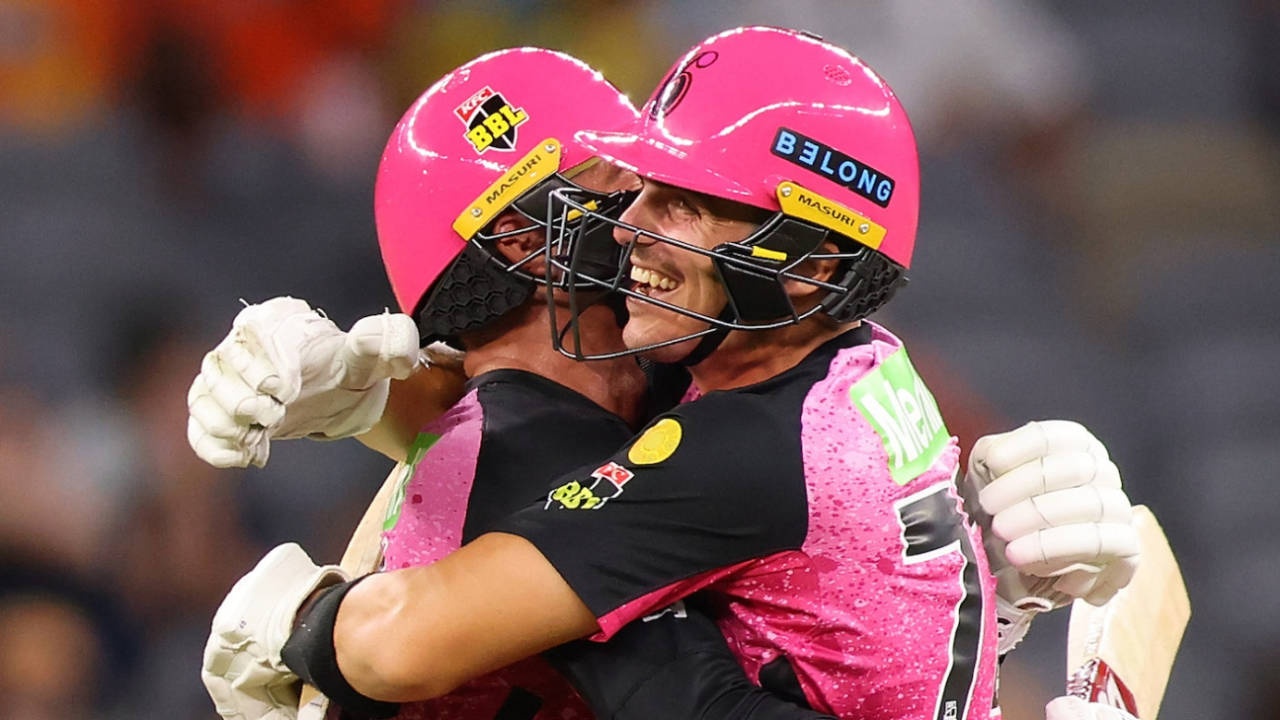 Moises Henriques and Sean Abbott hug it out after sealing the Sixers' win, Perth Scorchers vs Sydney Sixers, BBL, Perth, January 16, 2024