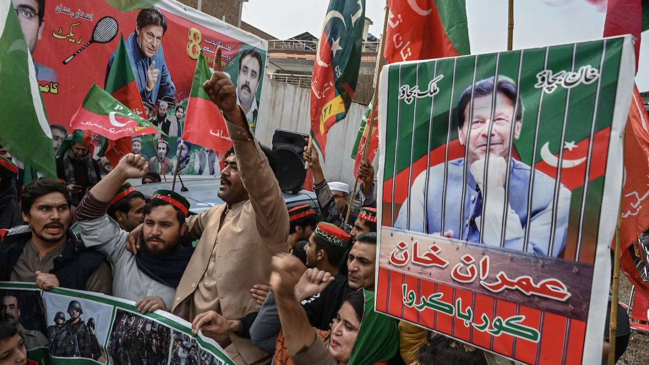 Supporters of Imran Khan's political party, Tehreek-e-Insaf, shout slogans during a protest, Peshawar, January 28, 2024