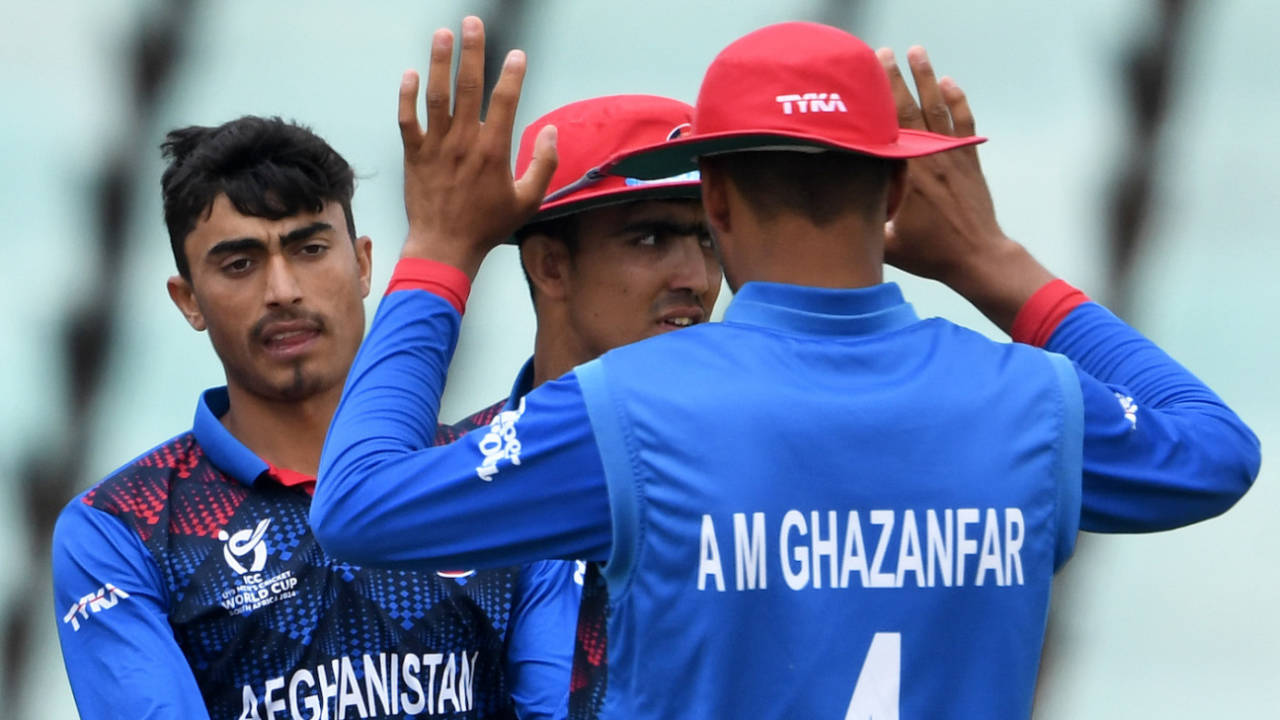 Arab Gul celebrates Aryaman Suri's wicket with his team-mates, Afghanistan vs USA, Under-19 World Cup Super Six, Benoni, January 31, 2024