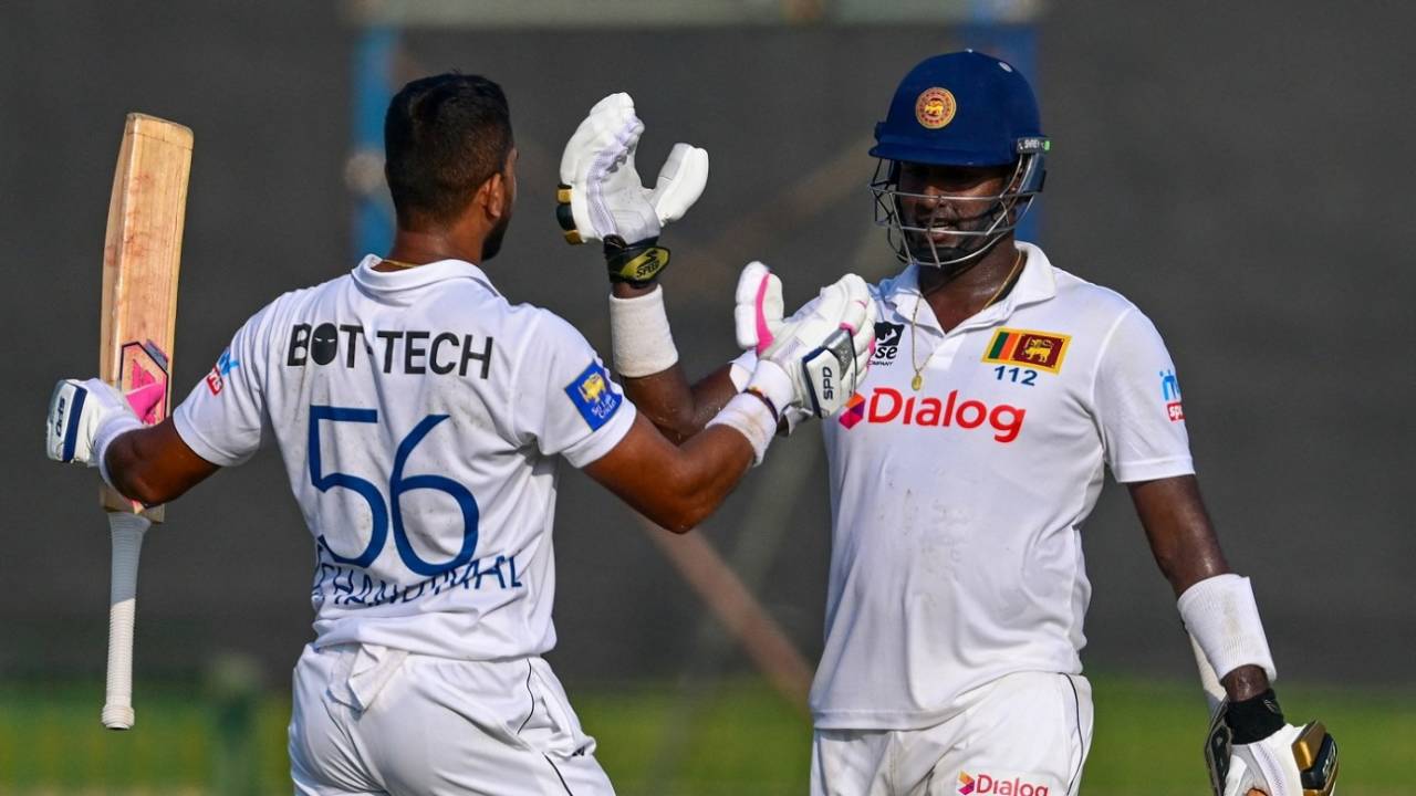 Dinesh Chandimal celebrates his century with Angelo Mathews, Sri Lanka vs Afghanistan, Only Test, Colombo, 2nd day, February 3, 2024