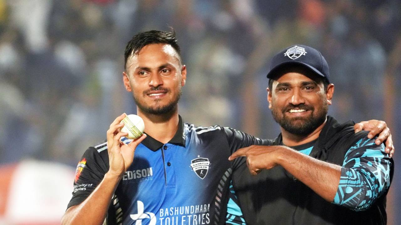 Abu Hider poses with Rangpur Riders bowling coach Tareq Aziz after bagging a five-wicket haul