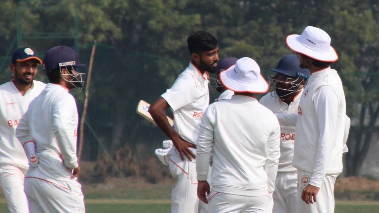 Mahesh Pithiya gets together with his team-mates after a wicket, Delhi vs Baroda, Ranji Trophy 2023-24, Group D, Delhi, 4th day, February 5, 2024