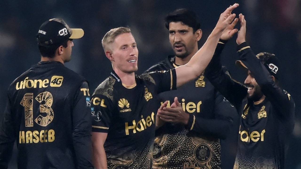 Luke Wood is mobbed by his team-mates, Islamabad United vs Peshawar Zalmi, PSL 2024, Lahore, February 26, 2024