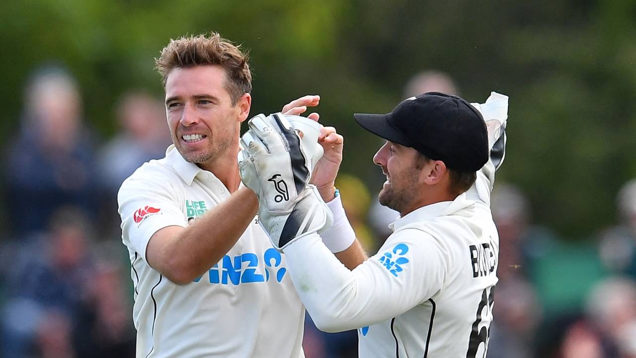 Tim Southee and Tom Blundell celebrate Travis Head's wicket