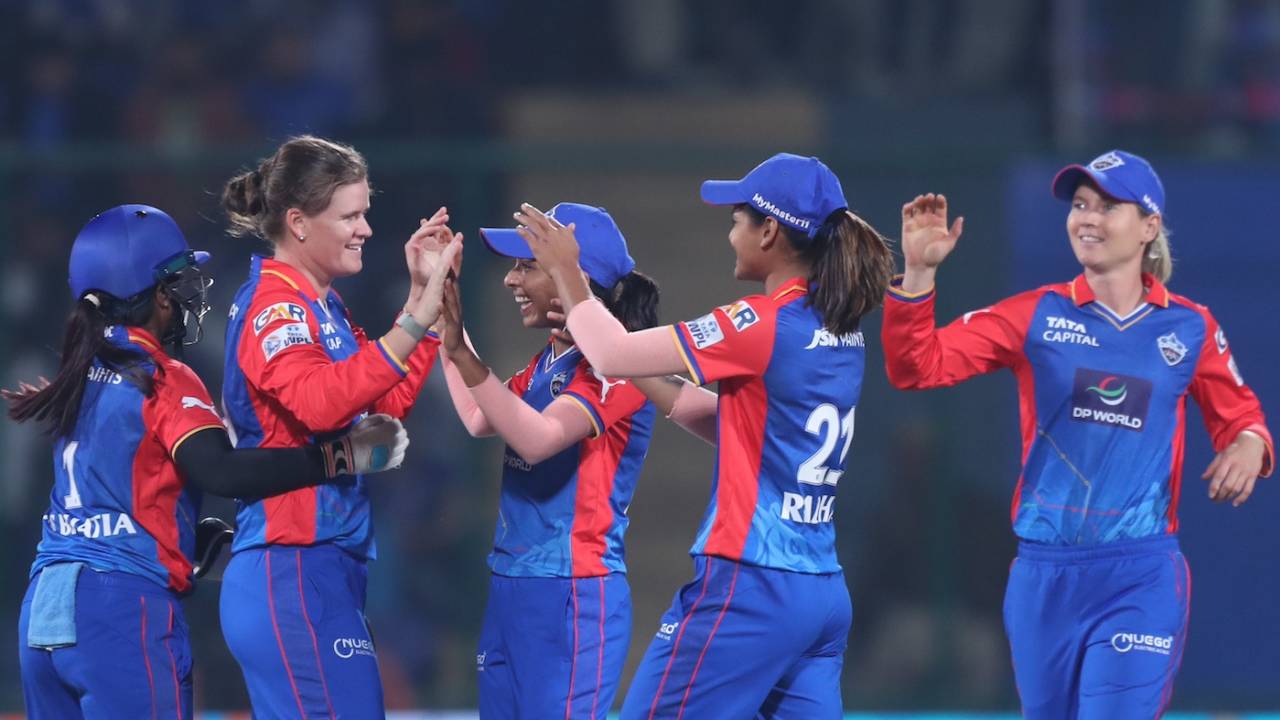 Jess Jonassen is joined by her team-mates after an early wicket, Delhi Capitals vs Gujarat Giants, WPL 2024, Delhi, March 13, 2024