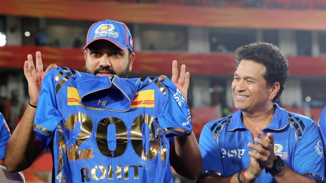 Rohit Sharma receives a special jersey from Sachin Tendulkar for his 200th IPL game as a Mumbai Indians player