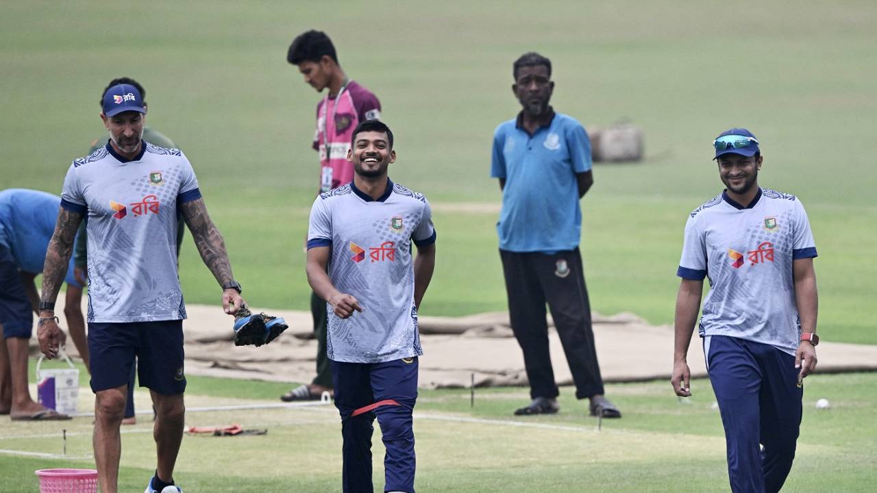 Nic Pothas, Najmul Hossain Shanto and Shakib Al Hasan are all smiles after looking at the pitch
