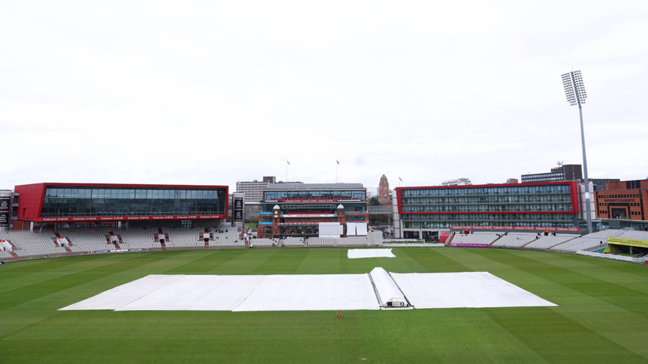 The covers were firmly in place after overnight rain, Lancashire vs Surrey, County Championship, Division One, Old Trafford, April 5, 2024