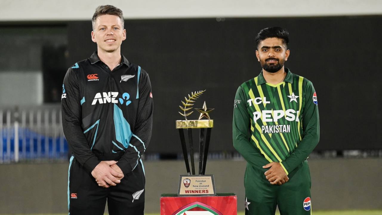 Michael Bracewell and Babar Azam with the T20I series trophy, Rawalpindi, April 17, 2024