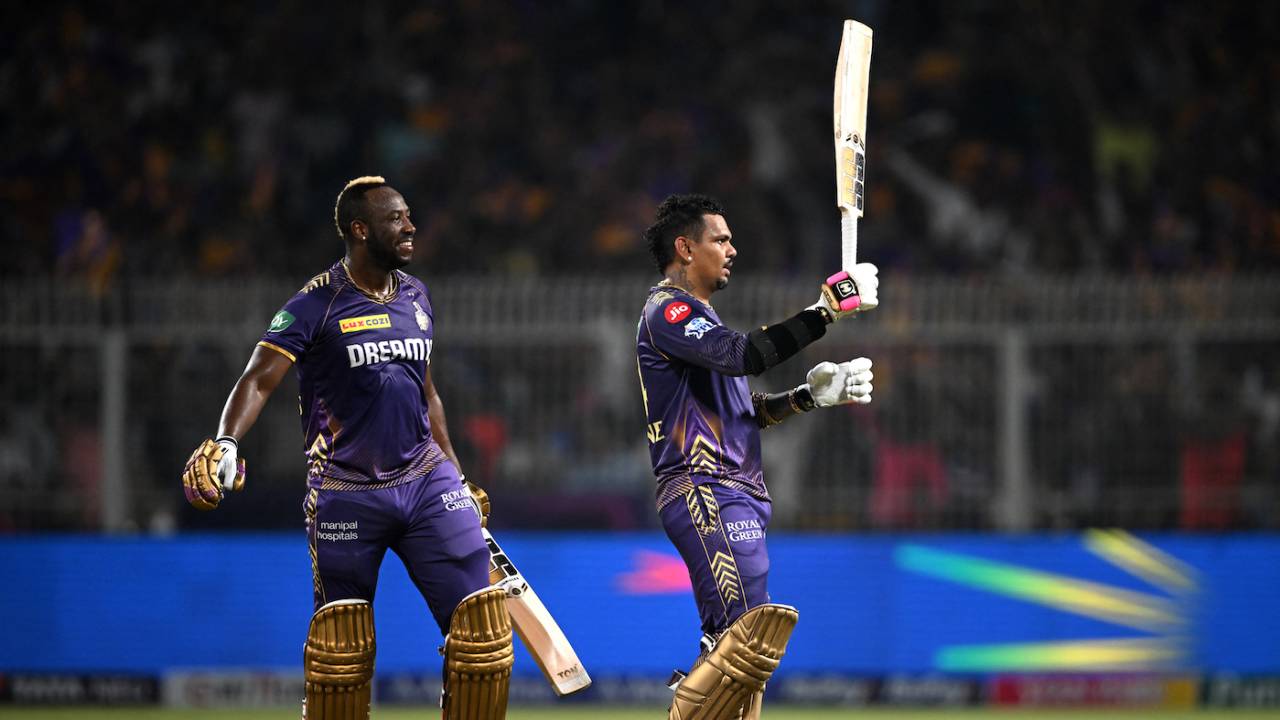 Sunil Narine celebrates his hundred in the company of Andre Russell
