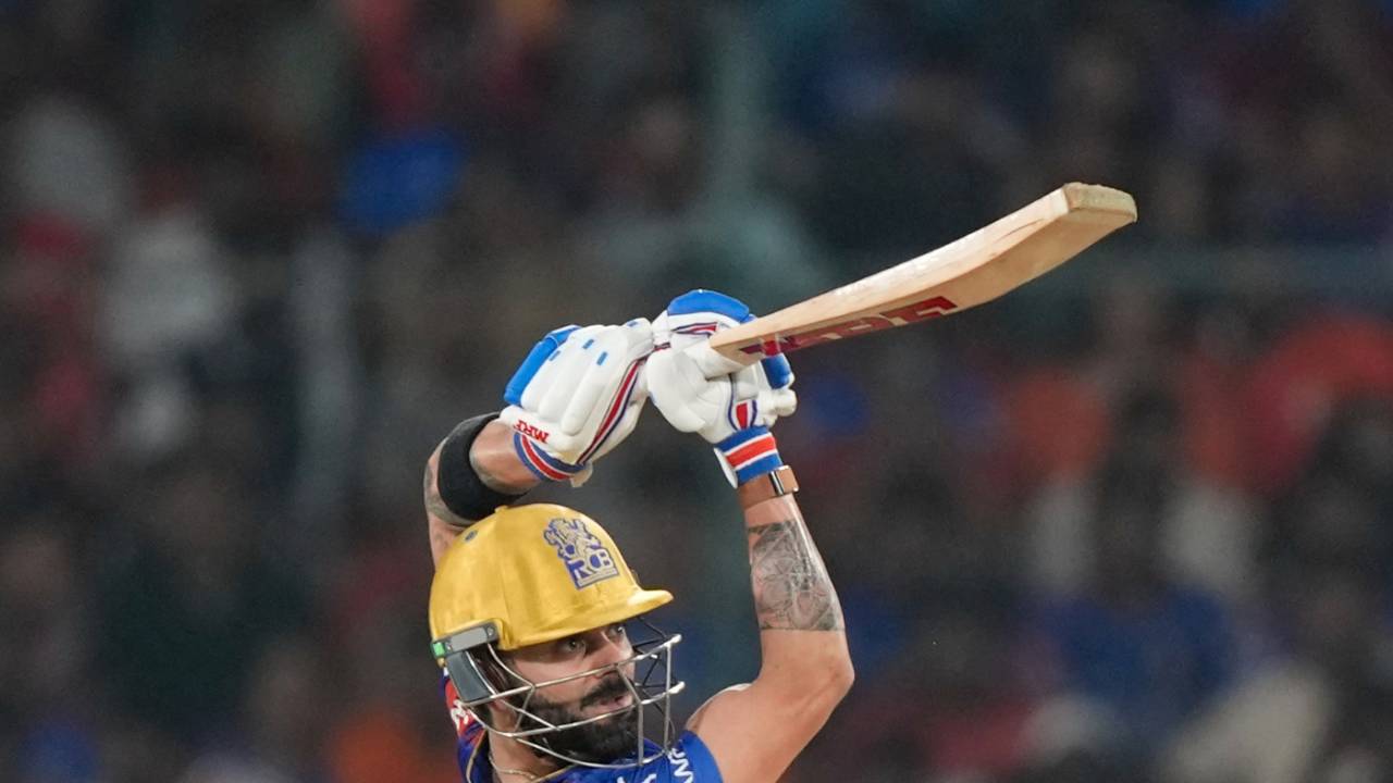 Virat Kohli launches one down the ground on his way to a 37-ball fifty