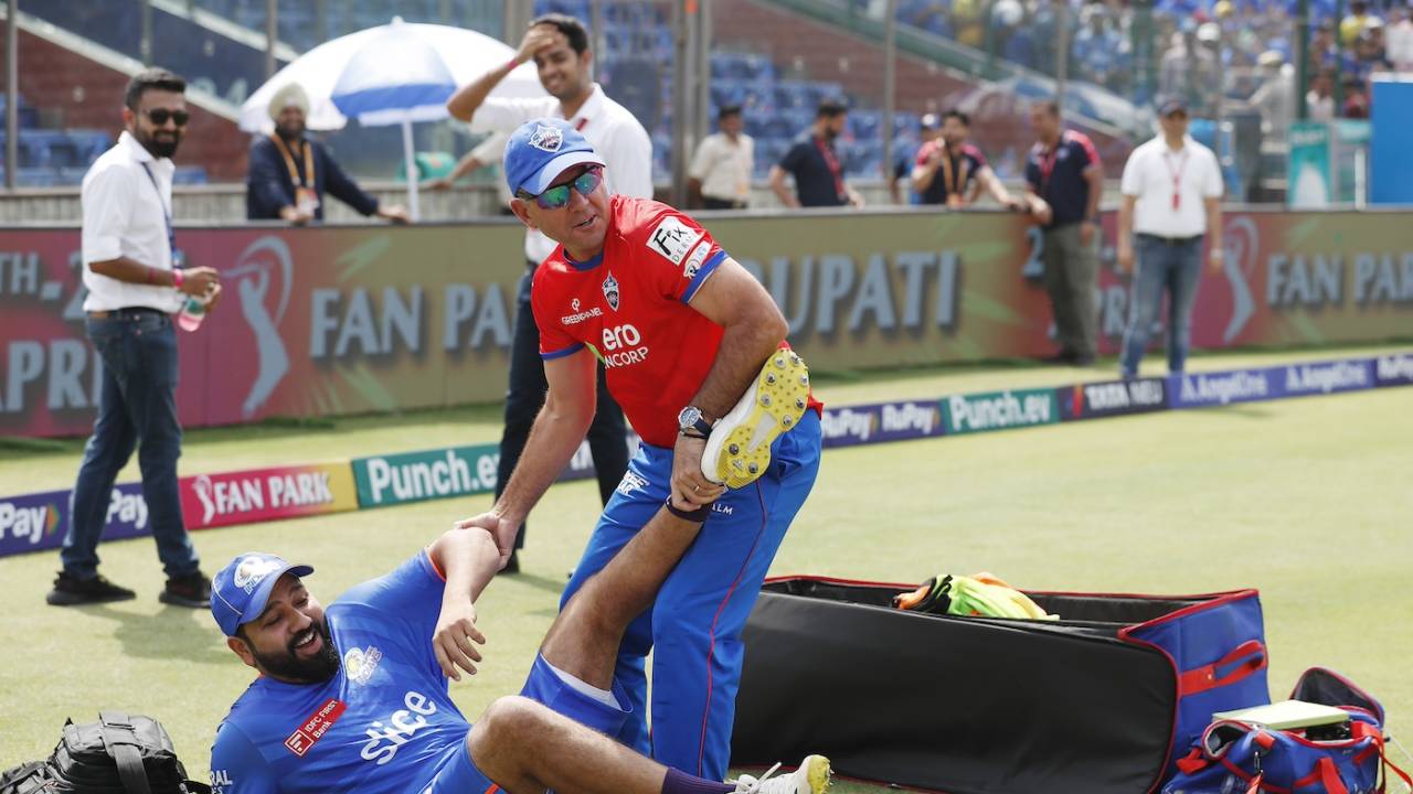 Let's get this guy outta here! Ricky Ponting and Rohit Sharma have a spot of fun