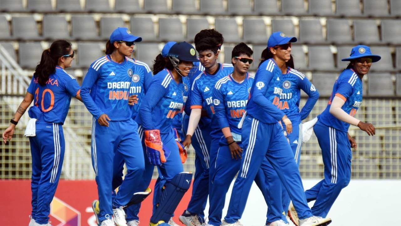 Smriti Mandhana leads a happy Indian side into the field