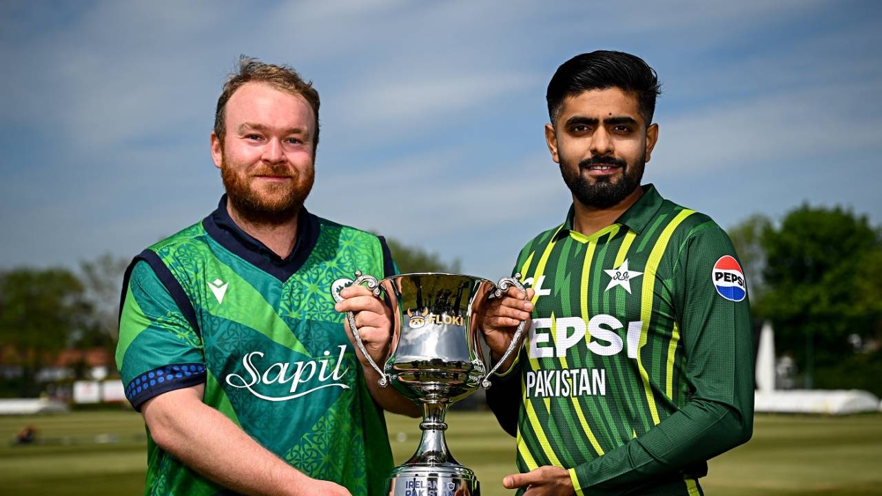 Paul Stirling and Babar Azam pose with the series trophy, Dublin, May 9, 2024