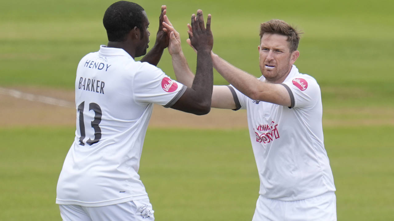 Liam Dawson gets a high five from Keith Barker, Hampshire vs Surrey, County Championship, Division One, Utilita Bowl, May 24, 2024