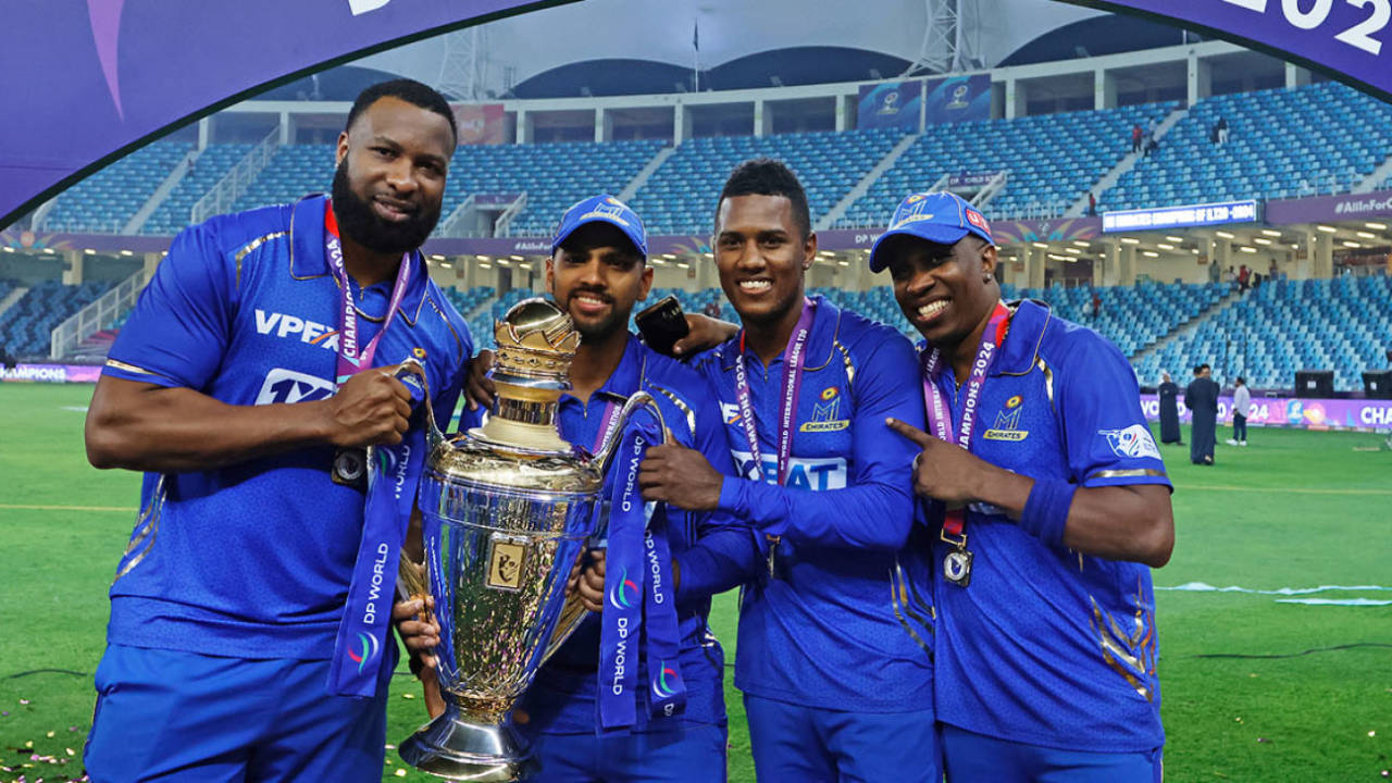 Kieron Pollard, Nicholas Pooran, Akeal Hosein and Dwayne Bravo celebrate MI Emirates' win, MI Emirates vs Dubai Capitals, final, Dubai, ILT20, February 17, 2024