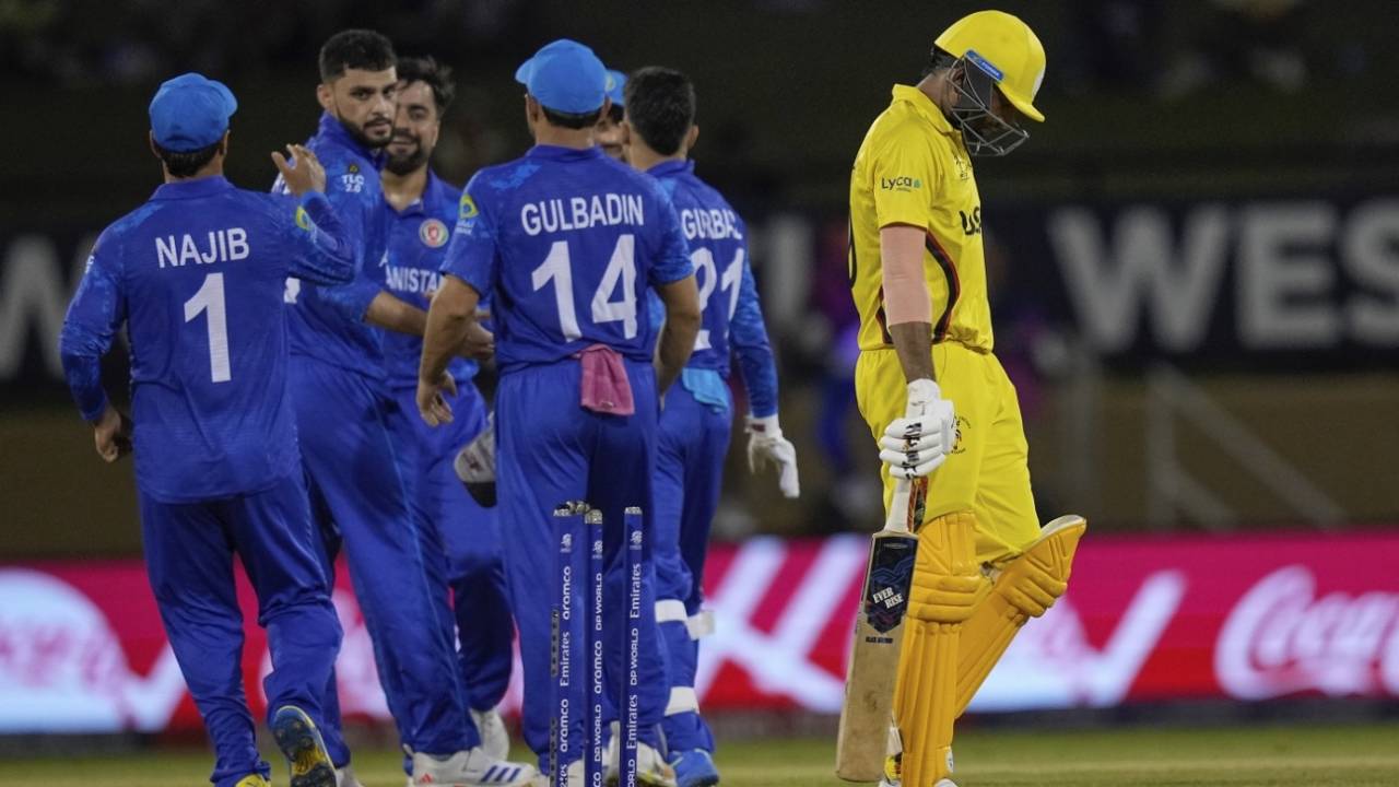 The Afghanistan players congratulate Naveen-ul-Haq for dismissing Dinesh Nakrani, Afghanistan vs Uganda, T20 World Cup 2024, Providence, June 3, 2024
