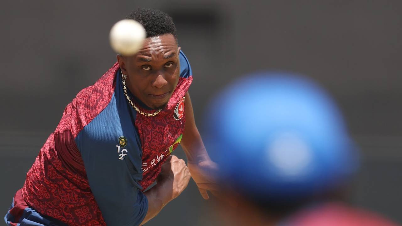 Afghanistan's bowling coach Dwayne Bravo bowls in the nets ahead of their T20 World Cup game against New Zealand, Georgetown, Guyana, June 6, 2024