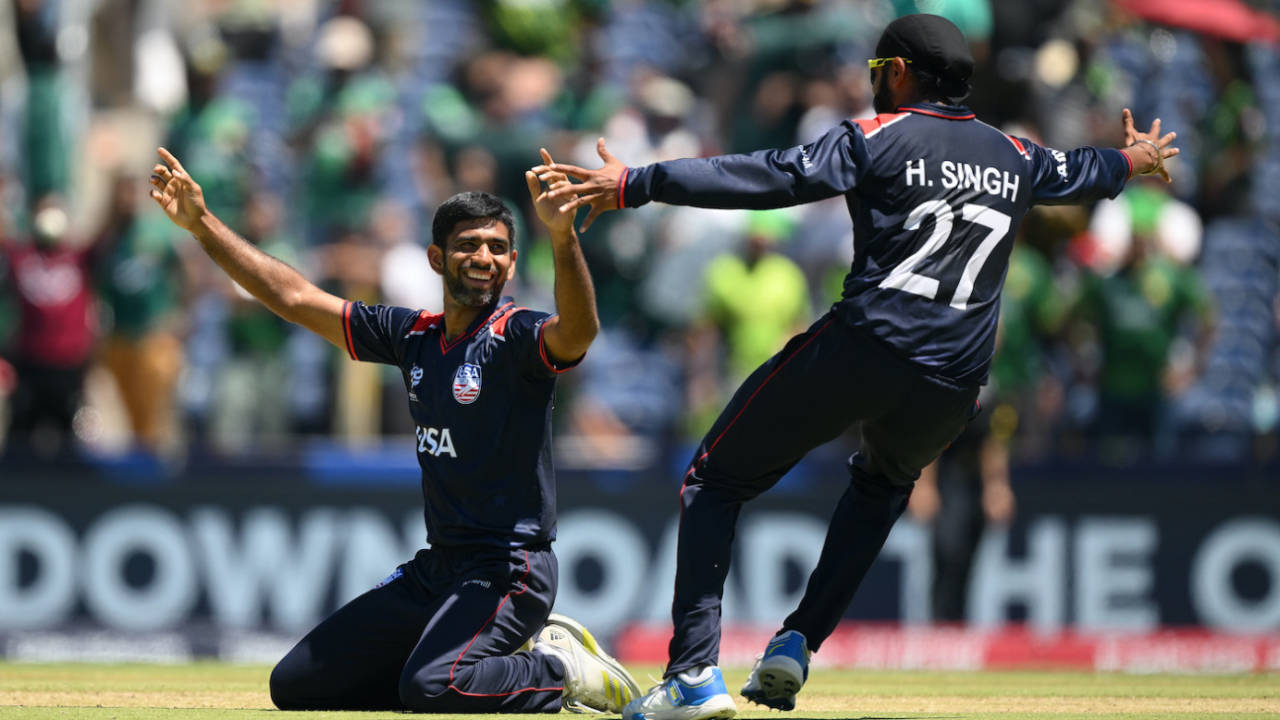 Saurabh Netravalkar sinks to his knees as Harmeet Singh rushes in to hug him after the victory in the Super Over Pakistan vs USA, T20 World Cup, Dallas, June 6, 2024