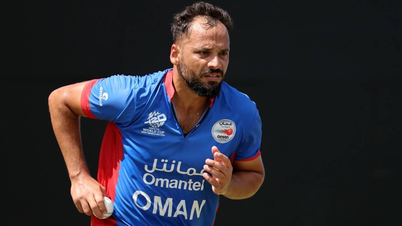 Fayyaz Butt runs in during a net-bowling session, North Sound, T20 World Cup 2024, June 12, 2024