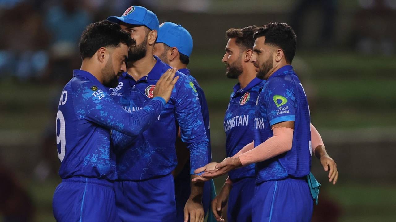 Fazalhaq Farooqi celebrates a wicket with his team-mates, Afghanistan vs PNG, T20 World Cup, Group C, Trinidad, June 13, 2024