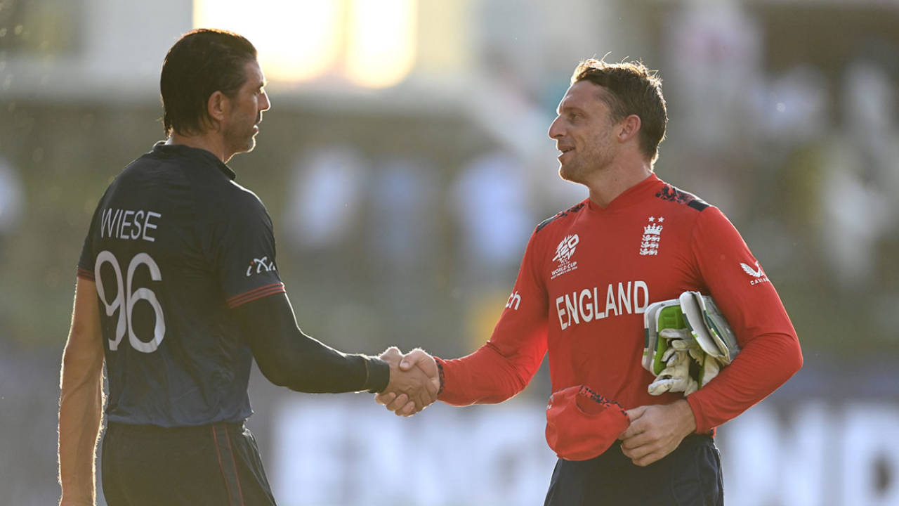 Jos Buttler shakes hands with David Wiese, England vs Namibia, T20 World Cup 2024, North Sound, June 15, 2024