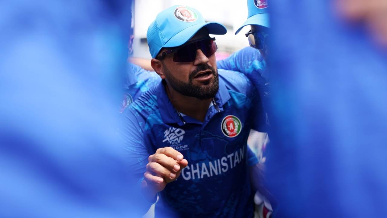 Rashid Khan has the final few words with his side before play begins, Afghanistan vs India, T20 World Cup Super Eight, Bridgetown, June 20, 2024