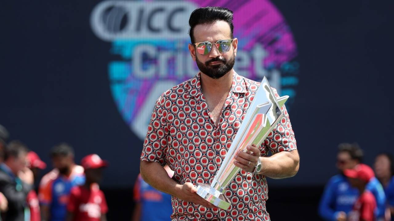 Former India allrounder Irfan Pathan carries the T20 World Cup trophy to the field of play, Afghanistan vs India, T20 World Cup Super Eight, Bridgetown, June 20, 2024