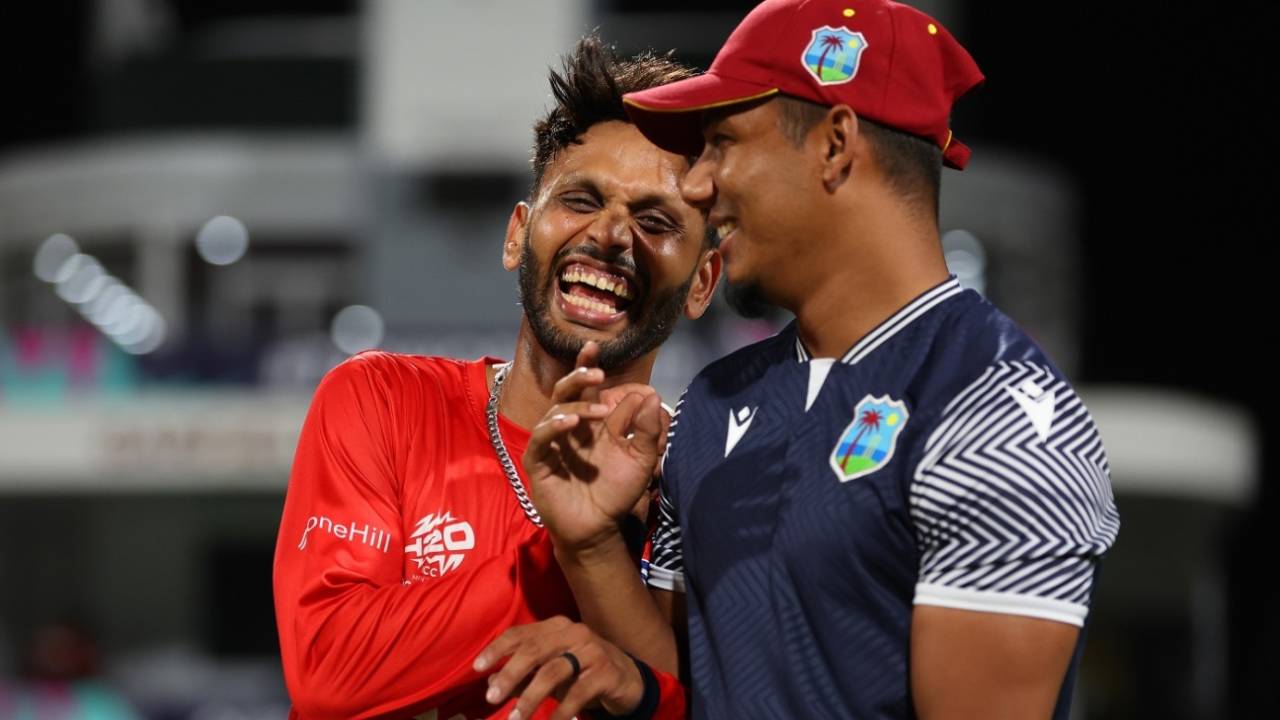 Milind Kumar and Gudakesh Motie share a light moment, West Indies vs USA, T20 World Cup 2024, Super Eight, Bridgetown, June 21, 2024