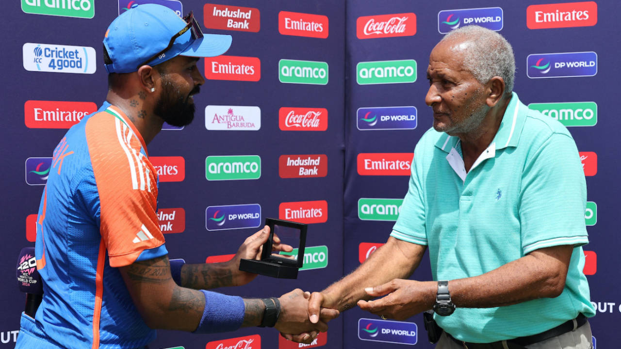 Hardik Pandya received his Player-of-the-Match award from Andy Roberts, Bangladesh vs India, Super Eight, T20 World Cup, Antigua, June 22, 2024