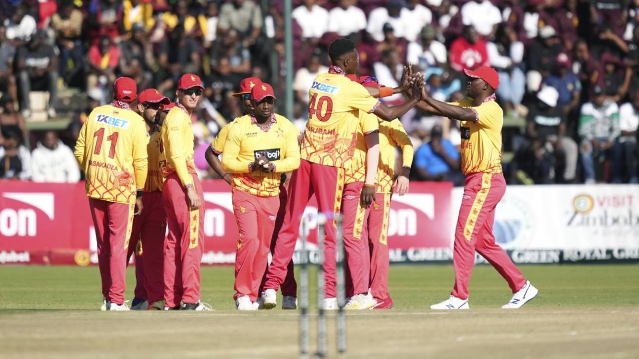 Blessing Muzarabani celebrates a wicket with his team-mates, Zimbabwe vs India, 1st T20I, Harare, July 6, 2024
