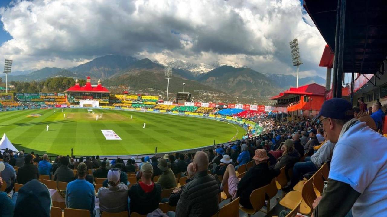 Andy Clark (right) looks on during his final Test as a spectator, at Dharamsala in March 2024