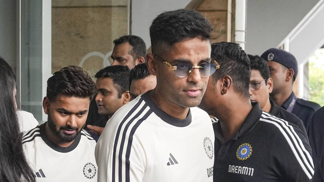 Suryakumar Yadav and Rishabh Pant make their way through the crowd, Mumbai, July 22, 2024
