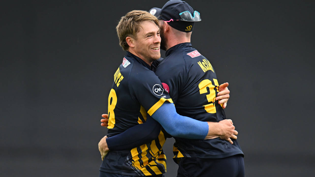 Dan Douthwaite gets a hug from Jamie McIlroy, Somerset vs Glamorgan, Vitality Blast, Taunton, June 16, 2024