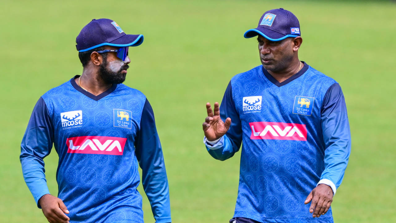 Sri Lanka's new T20I captain and coach, Charith Asalanka and Sanath Jayasuriya, have a chat, Pallekele, July 25, 2024