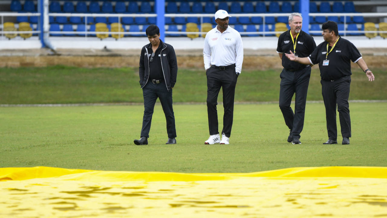 Match officials - Sharfuddoula, Gregory Brathwaite, Richard Illingworth, and Ahsan Raza - busy themselves in an inspection, West Indies vs South Africa, 1st Test, Port-of-Spain, day 4, August 10, 2024