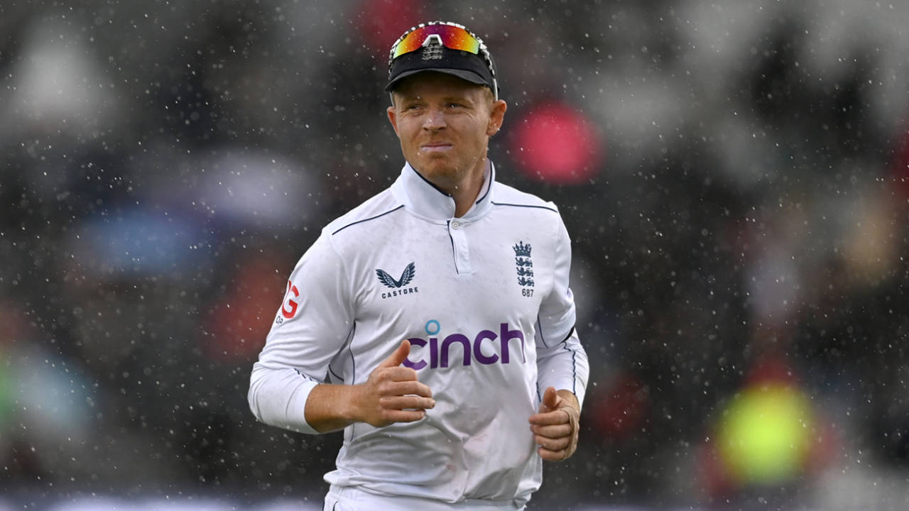 Ollie Pope runs off during a rain shower, England vs Sri Lanka, 1st Men's Test, Emirates Old Trafford, 4th day, August 24, 2024