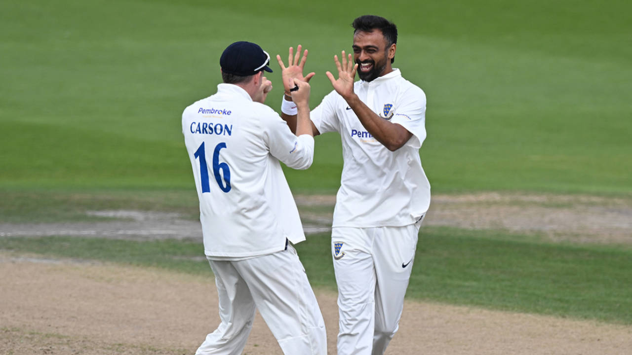 Jaydev Unadkat celebrates a breakthrough with Jack Carson, Sussex vs Derbyshire, County Championship, Hove, August 30, 2024