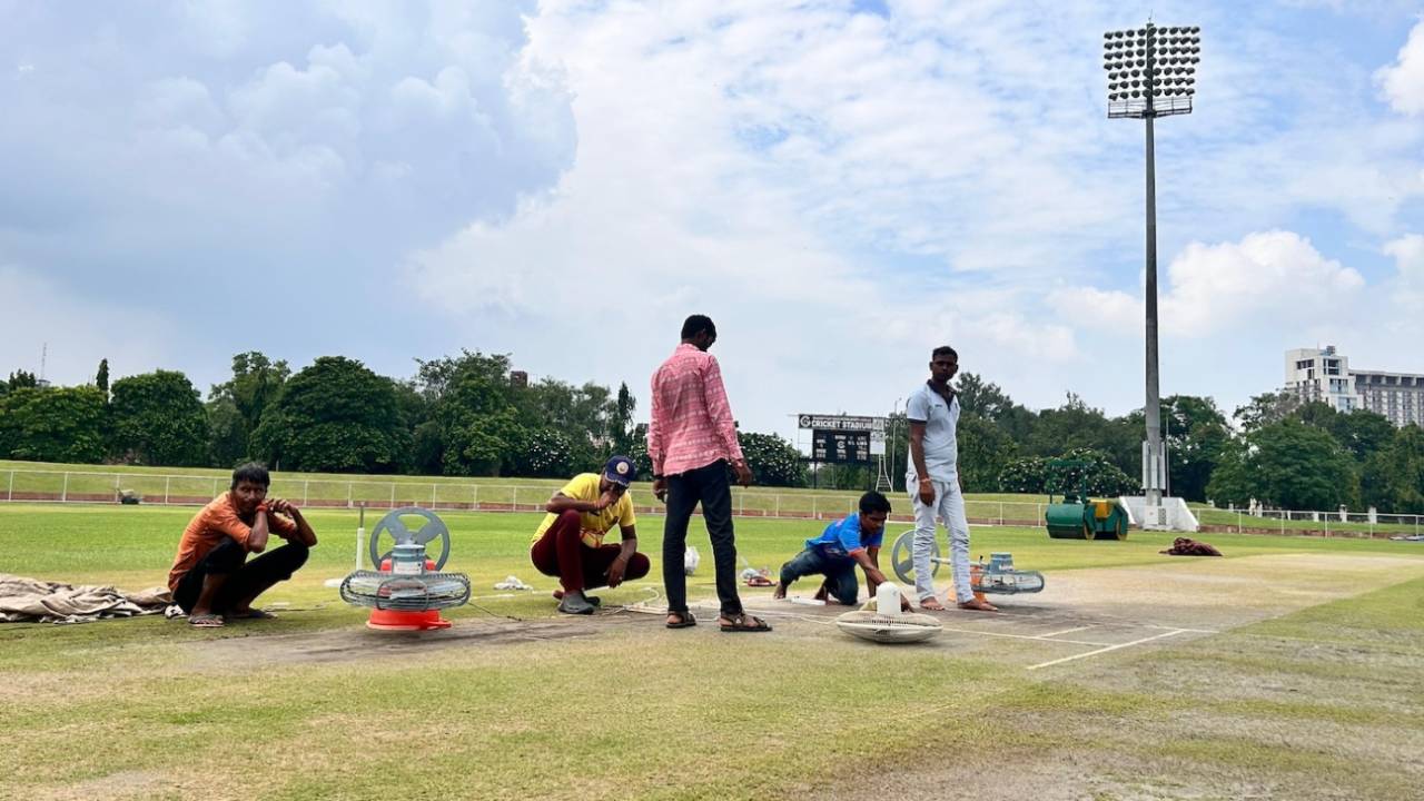 Fans put to work to dry the pitch after heavy rains in the region, Greater Noida, August 30, 2024