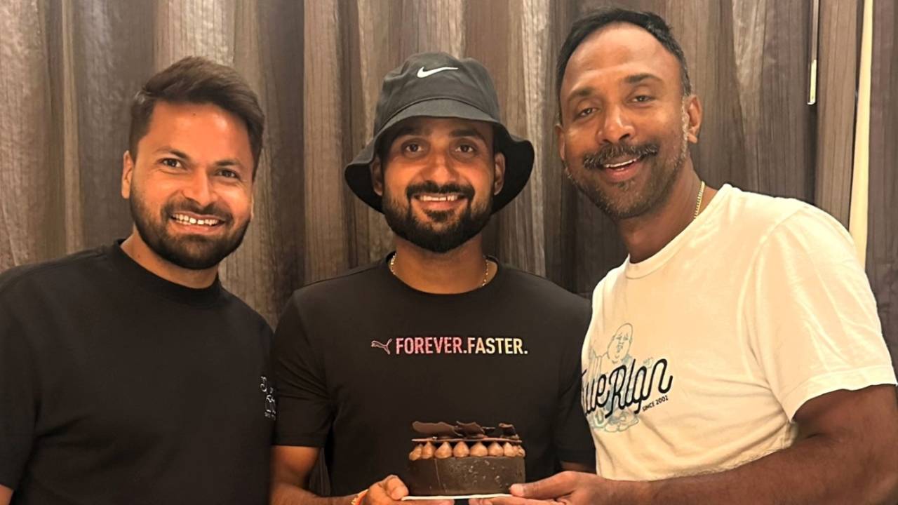 Mukesh Kumar and Akash Deep bring Saurasish Lahiri a birthday cake, Bengaluru, September 8, 2024