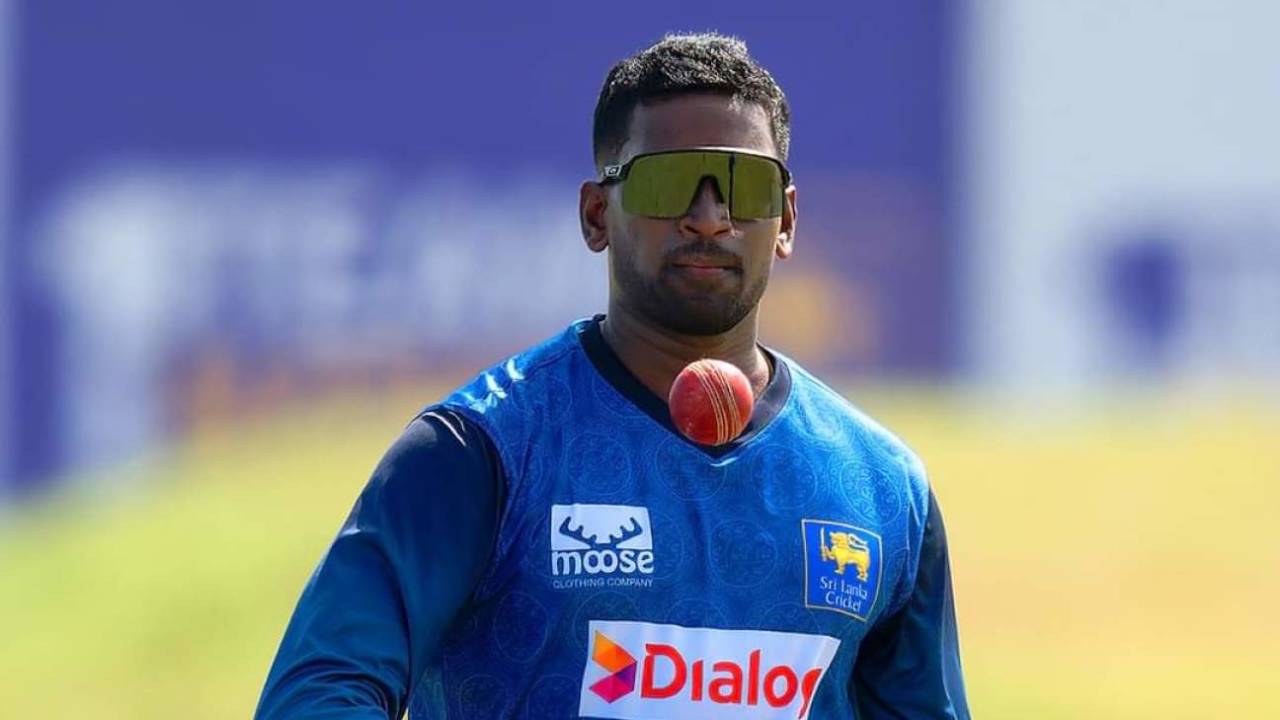 Nishan Peiris prepares to bowl