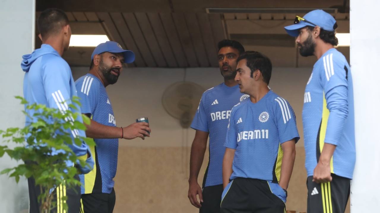 Rohit Sharma and Gautam Gambhir chat around during a rain delay, India vs Bangladesh, 2nd Test, 2nd day, Kanpur, September 28, 2024