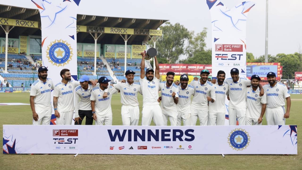 Akash Deep holds the series trophy aloft as the Indians celebrate, India vs Bangladesh, 2nd Test, Kanpur, 5th day, October 1, 2024